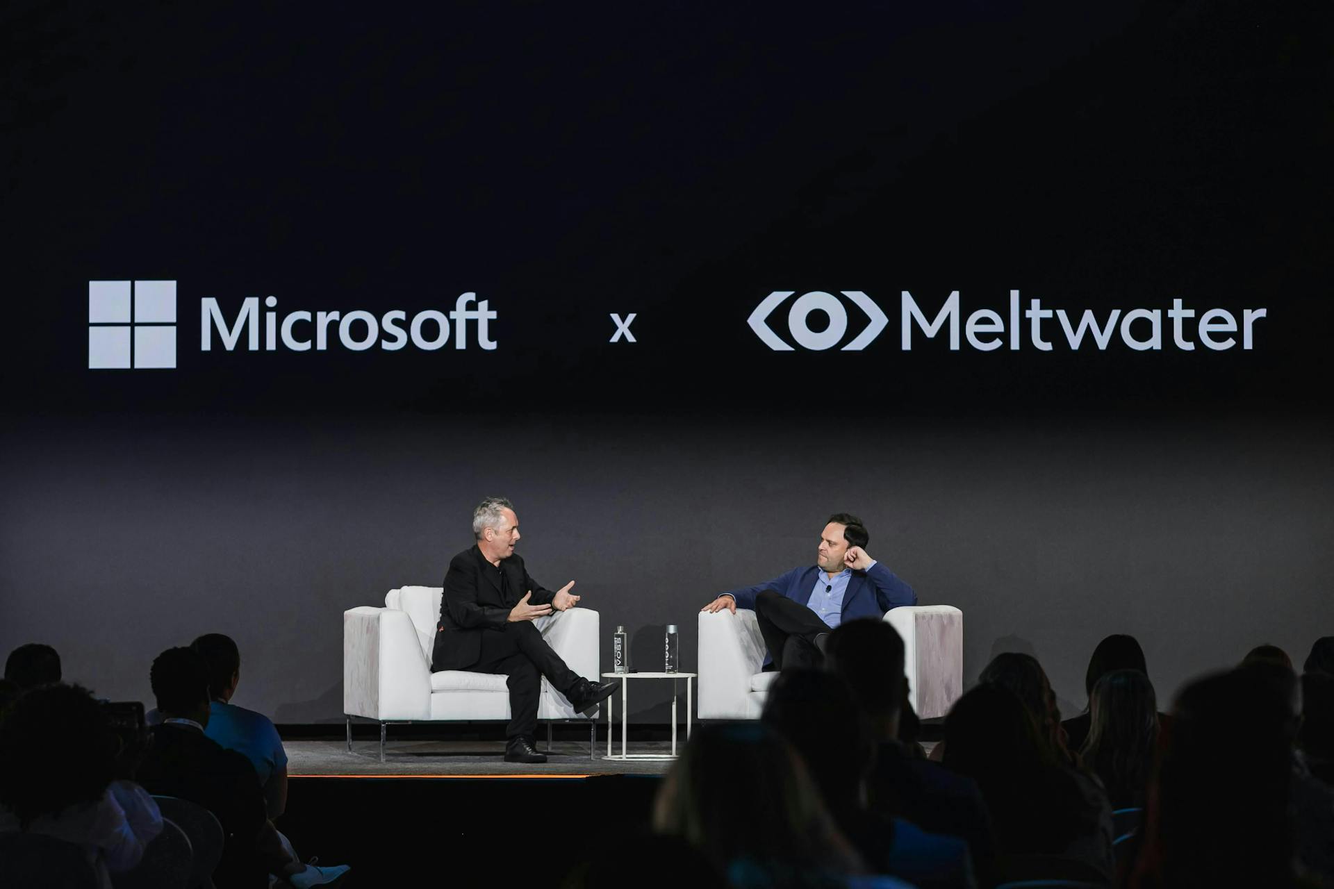 Microsoft VP of Communications Strategy Steve Clayton onstage with Meltwater CEO John Box at Meltwater Summit 2024