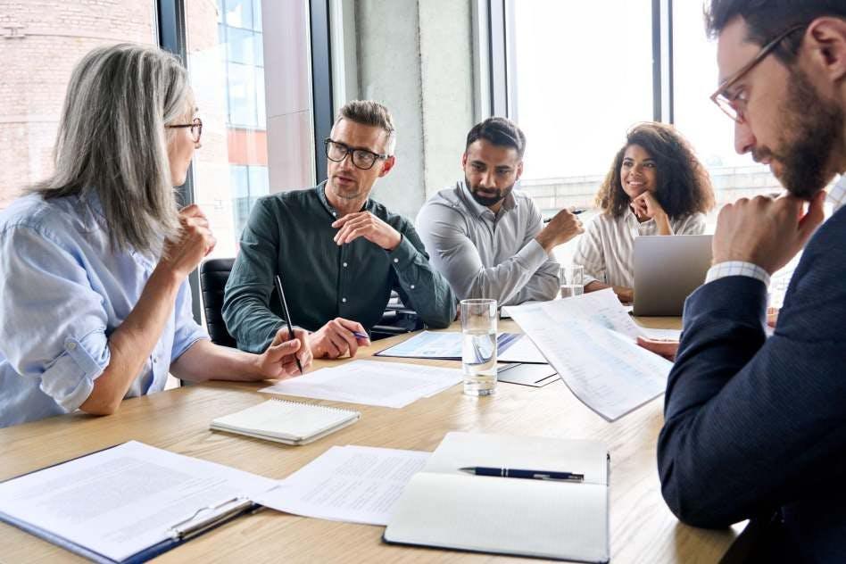 team in a meeting running a target group analysis